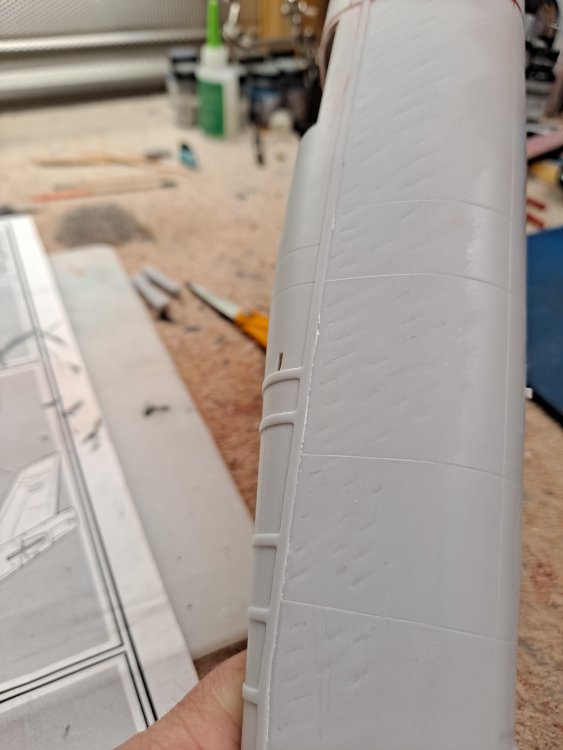 17. Left side fuselage wrinkles in work.jpg