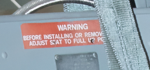 07C_Upper_seatback_Warning_Decal.jpg.60016463bd1ea8cb0b56f9cb78673896.jpg